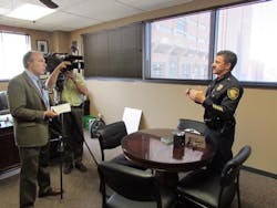 Fort Worth Police Chief Jeffrey Halstead talks with local media on the purchase of body cameras for officers.