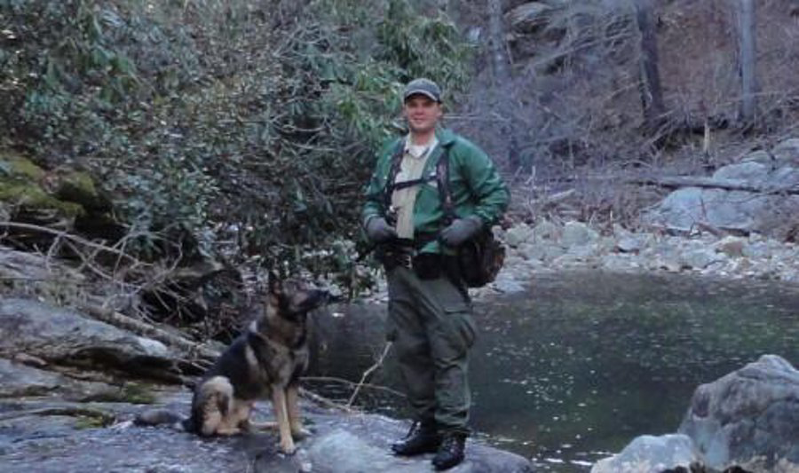 U.S. Forest Service Officer Jason Crisp and K-9 Maros