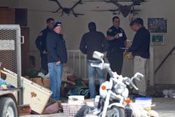 Authorities investigate a crime scene at a house in Pleasant Grove, Utah on April 13. Authorities investigate a crime scene at a house in Pleasant Grove, Utah on April 13.