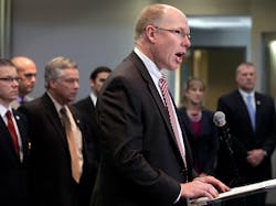 John Strong, special agent in charge of the FBI in North Carolina, addresses members of the media during a press conference at the Wake Forest Town Hall on on April 10 in Wake Forest, N.C.