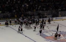 A charity hockey game between New York City police and firefighters at the Nassau Coliseum erupted into a brawl on ice Sunday. A charity hockey game between New York City police and firefighters at the Nassau Coliseum erupted into a brawl on ice Sunday.