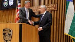 New York City Mayor Bill de Blasio, left, greets incoming NYPD Commissioner William J. Bratton during a joint news conference at police headquarters on Jan. 2. New York City Mayor Bill de Blasio, left, greets incoming NYPD Commissioner William J. Bratton during a joint news conference at police headquarters on Jan. 2.