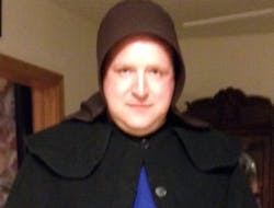 Pulaski Township Police Sgt. Chad Adams is seen dressed as an Amish woman.