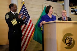 Former Boston police commissioner Kathleen O&apos;Toole center, speaks after being introduced by Seattle Mayor Ed Murray, right, as his nominee to be Seattle&apos;s new Chief of Police on May 19.
