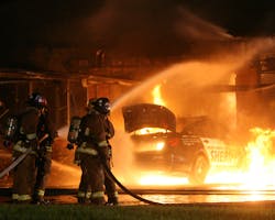 A Ramsey County sheriff&apos;s squad car spun out on a curve during a Thursday night pursuit and crashed into a commercial building in Vadnais Heights, hitting a natural gas line and sparking a fire.