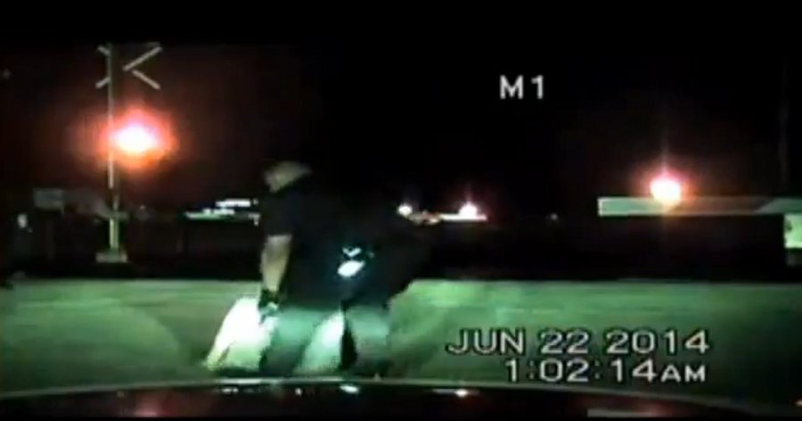 Richmond Police Officer Ramon Morales rescued a woman who was sitting on railroad tracks in the path of an oncoming train Sunday.