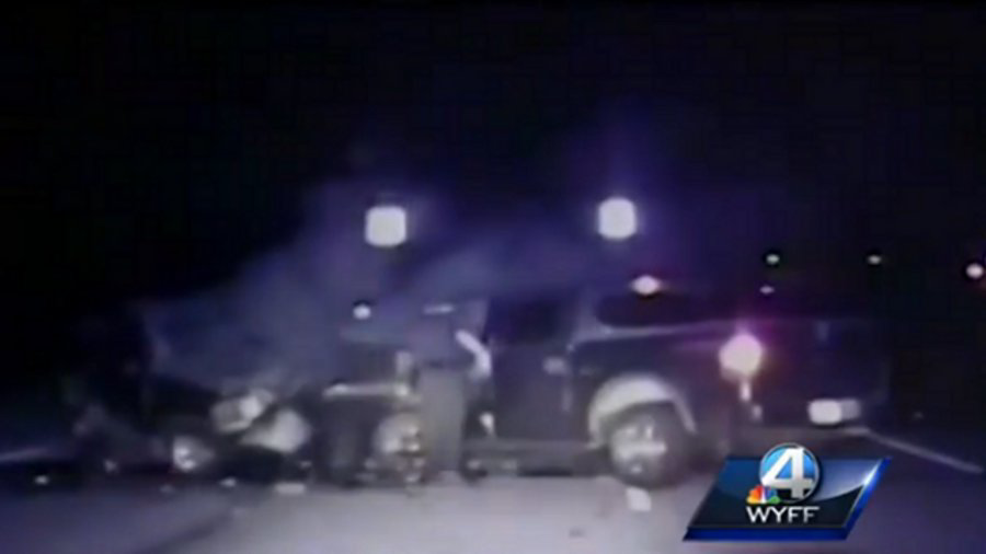 Dash camera video shows the heroic efforts of two Travelers Rest, S.C. police officers to rescue a driver who later died.