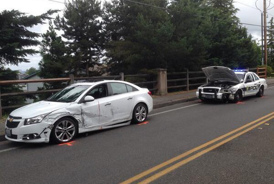 A man struck a Puyallup police car Tuesday during a pursuit that stemmed from a domestic violence incident.