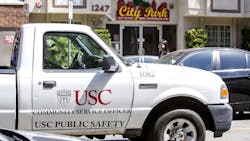 A USC Public Safety vehicle in front of the Los Angeles apartment building on July 25 in Los Angeles.