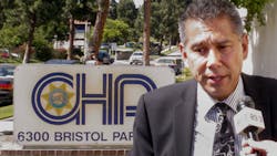 California Highway Patrol Commissioner Joe Farrow takes question from the media outside the CHP offices after a meeting with a group of community activists.