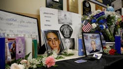 A makeshift memorial is seen for Jersey City Police officer Melvin Santiago, who was killed while on duty at the West District precinct on July 15.
