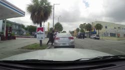 Miami police are investigating an embarrassing roadside scuffle between two of their own after a traffic stop devolved into an afternoon wrestling match. Miami police are investigating an embarrassing roadside scuffle between two of their own after a traffic stop devolved into an afternoon wrestling match.