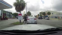 Miami police are investigating an embarrassing roadside scuffle between two of their own after a traffic stop devolved into an afternoon wrestling match.