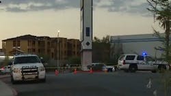 A Henderson police officer was tabbed and a suspect was killed during a confrontation early Tuesday morning.