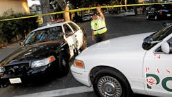 Pasadena police officers block off a street corner following a shooting in residential Pasadena neighborhood, in Pasadena, Calif. on July 12. Pasadena police officers block off a street corner following a shooting in residential Pasadena neighborhood, in Pasadena, Calif. on July 12.