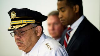 Philadelphia Police Commissioner Charles Ramsey, left, speaks during a news conference.