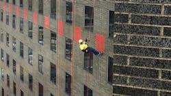 Gloucester Police Chief Leonard Campanello rappelled down the side of the 23-story Hyatt Regency Hotel Saturday as part of the Special Olympics' 'toss your boss' fundraiser. Gloucester Police Chief Leonard Campanello rappelled down the side of the 23-story Hyatt Regency Hotel Saturday as part of the Special Olympics' 'toss your boss' fundraiser.