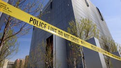 Police tape surrounds the Federal Courthouse, in Salt Lake City on April 21.