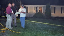 police investigate the home where a family of five, including three children, were found shot to death Sunday night, in Culpeper, Va. police investigate the home where a family of five, including three children, were found shot to death Sunday night, in Culpeper, Va.