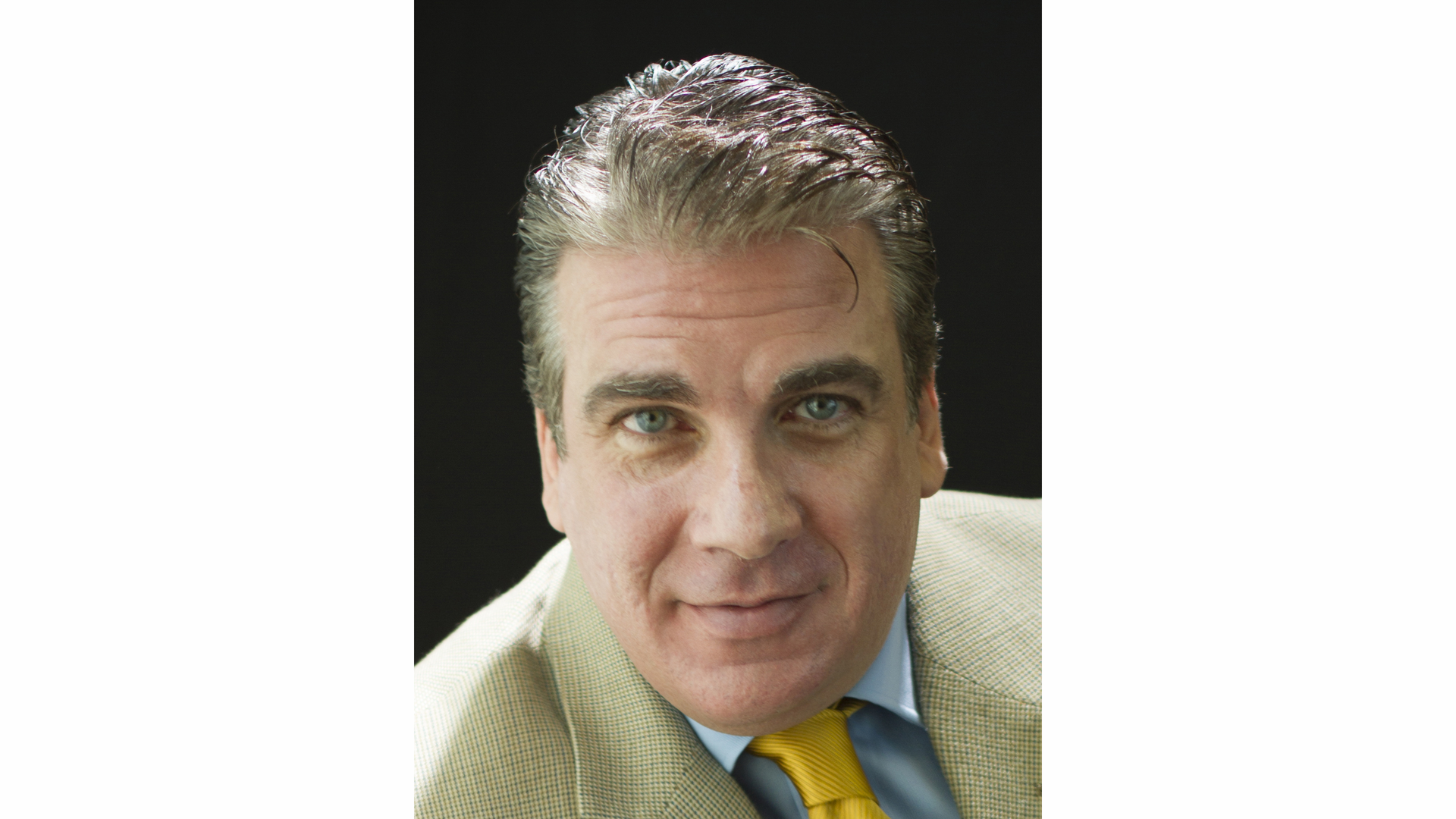 John Chigos Headshot 5409e21a46eda