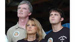 Holly Bobo&apos;s father Dana, mother Karen and brother Clint look on during a press conference in Parsons, Tenn.