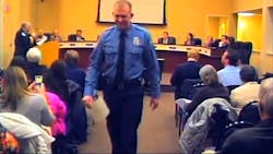 A police charity has stopped taking donations for Darren Wilson until determining the tax implications of spending proceeds on his legal bills, organizers said Tuesday.