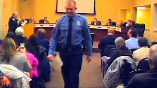 A police charity has stopped taking donations for Darren Wilson until determining the tax implications of spending proceeds on his legal bills, organizers said Tuesday.