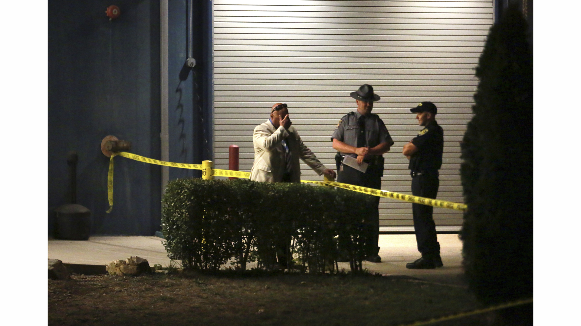 Montgomery County officials and the Pennsylvania State Police investigate the scene of an accidental shooting of a state trooper at a training range on the Montgomery County Public Safety Training Campus in Conshohocken, Pa. on Sept. 30.
