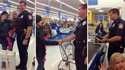 Emmett Township Officer Ben Hall is seen buying a booster seat for Alexis DeLorenzo and her 5-year-old daughter. Emmett Township Officer Ben Hall is seen buying a booster seat for Alexis DeLorenzo and her 5-year-old daughter.