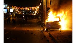 A St. Louis County police car is set on fire along South Florissant Road in Ferguson following the announcement of the grand jury decision on Nov. 24. A St. Louis County police car is set on fire along South Florissant Road in Ferguson following the announcement of the grand jury decision on Nov. 24.