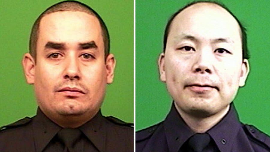 Officers Rafael Ramos, left, and Officer Wenjian Liu