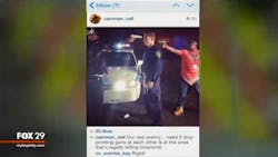 An image posted on Instagram by Philadelphia Paramedic Marcell Salters shows two black men pointing guns at the head of a white police officer.