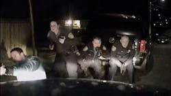 Patrol car cameras captured a shootout between Seattle police officers and a suspect on New Year&apos;s Eve.