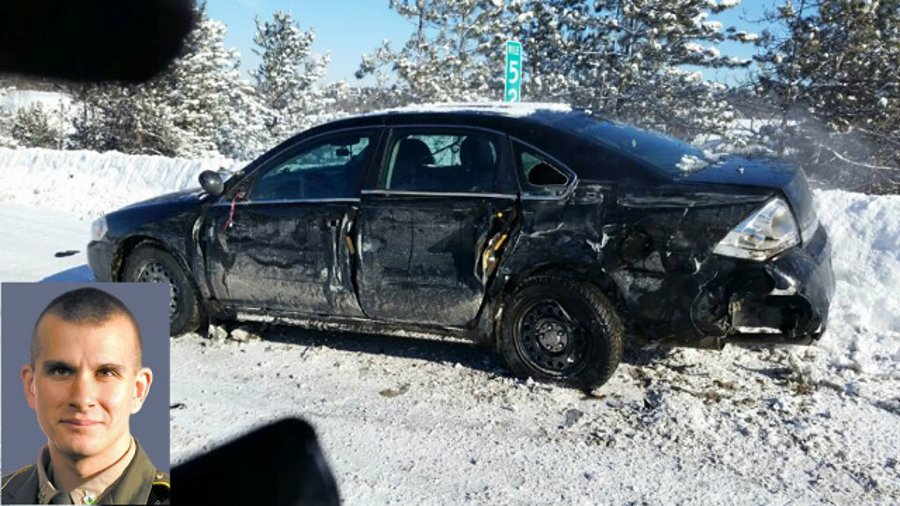 A tractor-trailer hit a Vermont State Police Trooper Darryl Cremo's unmarked cruiser from behind Tuesday.