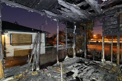 1st Place Photograph - Forensic Photography, 'Fire Fatality'by Christopher D. Duncan, Crime Scene Investigator, Houston Police Department. This photograph was recorded during a fire investigation and the image’s exposure settings were ISO 100, f/8, and 20 seconds. During that 20 seconds, multiple flashes were cast across the scene in order to highlight the dark structure. 1st Place Photograph - Forensic Photography, 'Fire Fatality'by Christopher D. Duncan, Crime Scene Investigator, Houston Police Department. This photograph was recorded during a fire investigation and the image’s exposure settings were ISO 100, f/8, and 20 seconds. During that 20 seconds, multiple flashes were cast across the scene in order to highlight the dark structure.