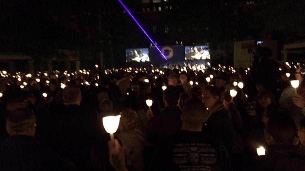More than 20,000 law enforcement officers, family members and survivors attended the Annual Candlelight Vigil.