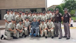 Cadets of the 63rd Oklahoma Highway Patrol Academy join Trooper Gary Sanders, center, as he continues to recover from injuries sustained in a crash in March. Cadets of the 63rd Oklahoma Highway Patrol Academy join Trooper Gary Sanders, center, as he continues to recover from injuries sustained in a crash in March.