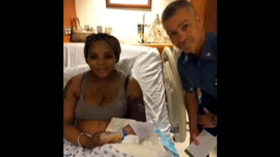 Trooper Paul Copponi helped a woman deliver her baby son on the Massachusetts Turnpike Saturday night.
