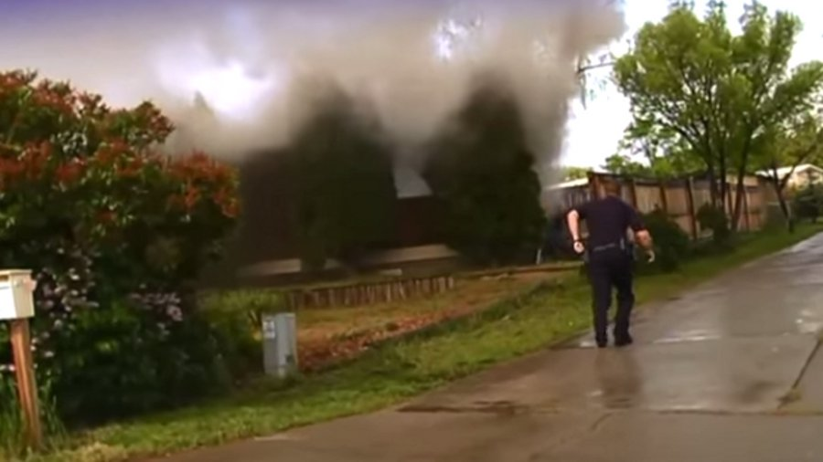 Los Alamos Cpl. James Keane rescued a man from his burning home last month, and it was all captured on dashcam video.