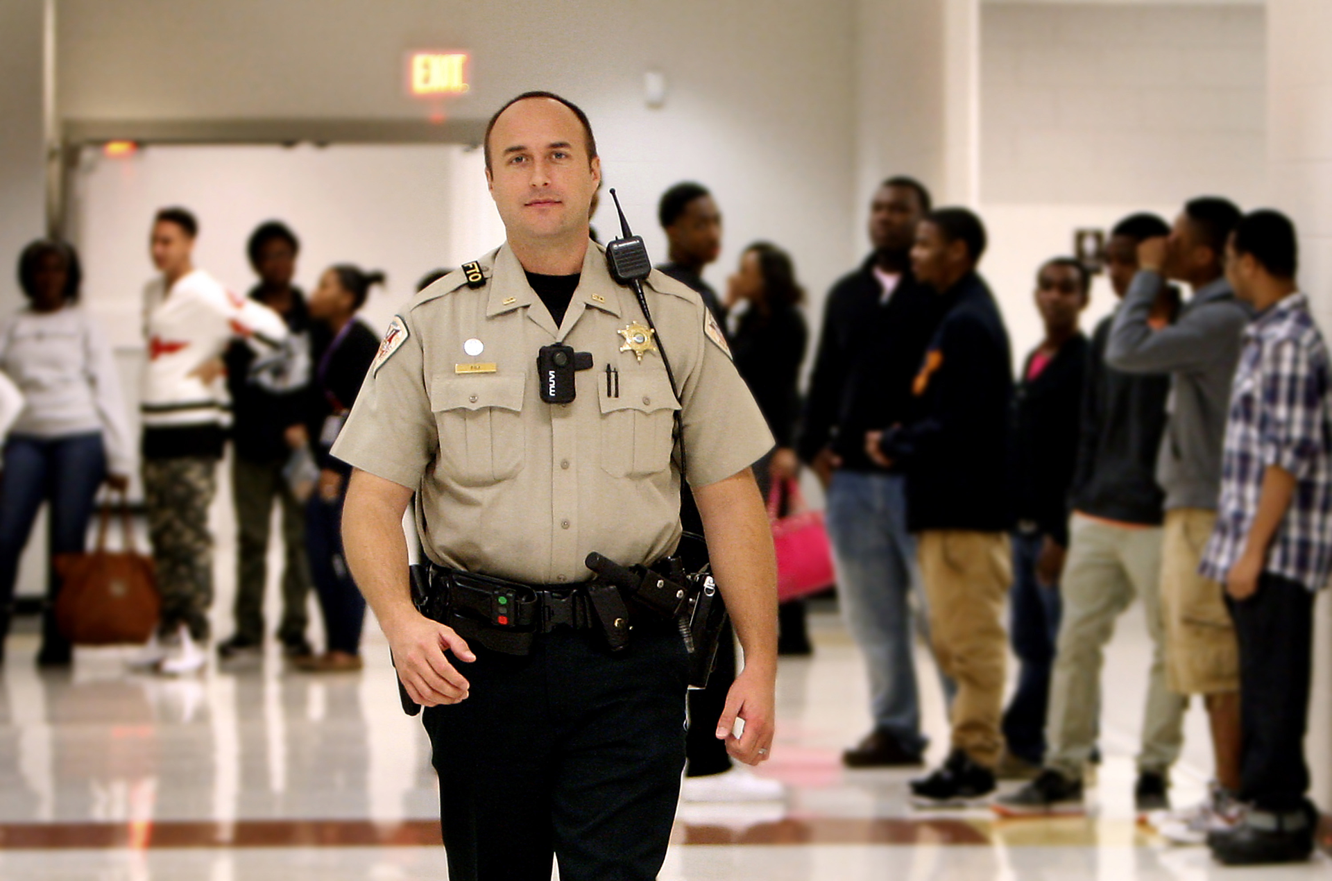 Shelby County Sheriff's Department SRO Joseph Fox wears a body camera while on duty on Oct. 15, 2014, at Southwind High School in Memphis, Tenn.