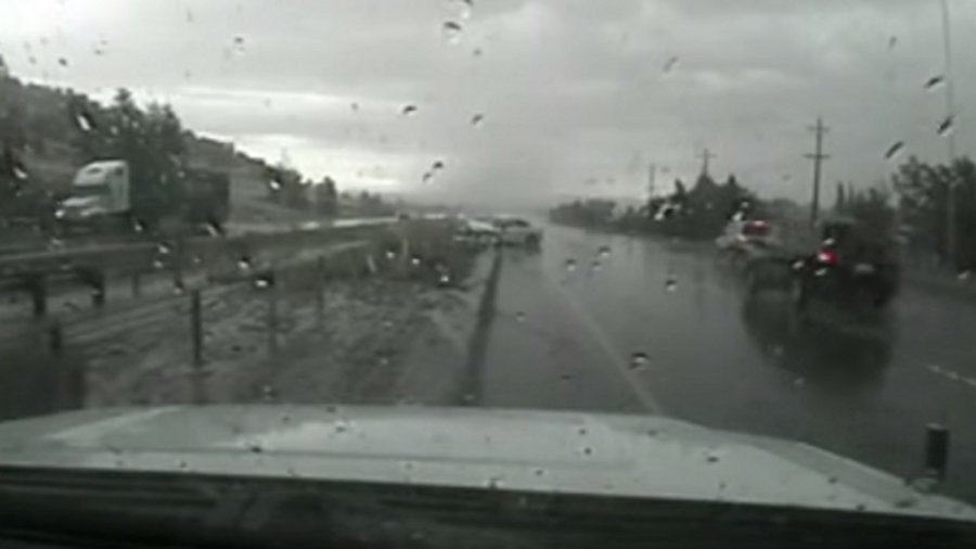 A Utah Highway Patrol trooper became pinned under a vehicle he was trying to help Monday afternoon.