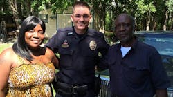 Savannah-Chatham Officer Robert Whitfield, center, went into a burning home to rescue an elderly man and his daughter. Savannah-Chatham Officer Robert Whitfield, center, went into a burning home to rescue an elderly man and his daughter.