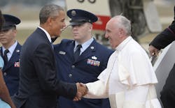 U.S. President Barack Obama greets His Holiness Pope Francis on his arrival at Joint Base Andrews in Maryland on Sept. 22.
