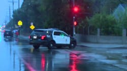A Los Angeles police sergeant was struck by a driver while searching for a robbery suspect early Tuesday morning.