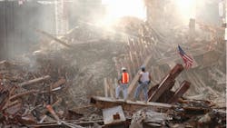 Two contractors are seen at the site of the World Trade Center in New York City on October 4, 2001. Two contractors are seen at the site of the World Trade Center in New York City on October 4, 2001.
