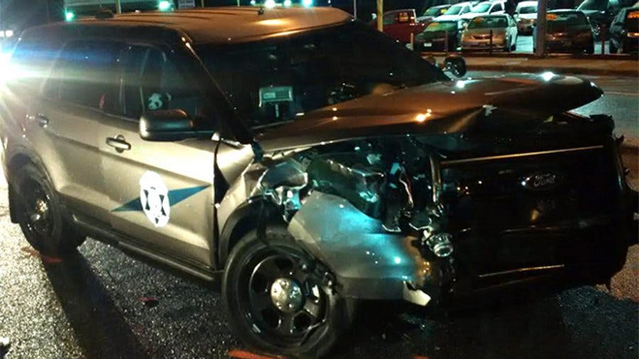 A Washington State Patrol trooper was seriously injured after a car slammed into his cruiser late Thursday night.