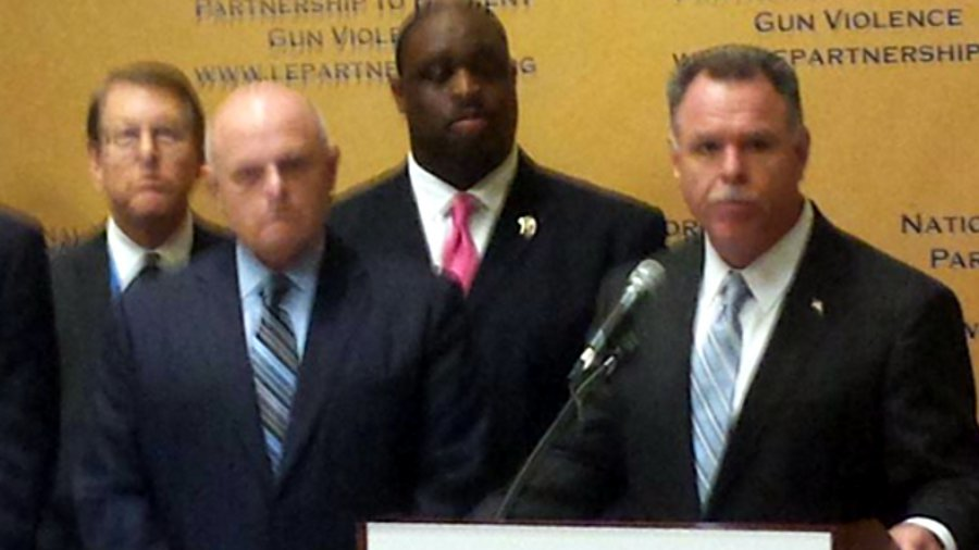 Police chiefs from across the country stood together on Monday at IACP 2015 to call for background checks for anyone who purchases a gun.