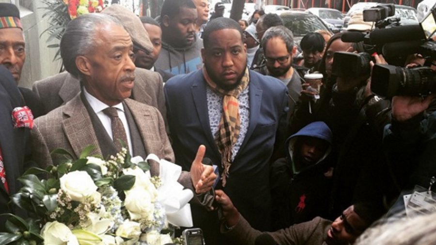 Longtime NYPD critic Al Sharpton on Saturday laid a memorial wreath for slain Police Officer Randolph Holder.