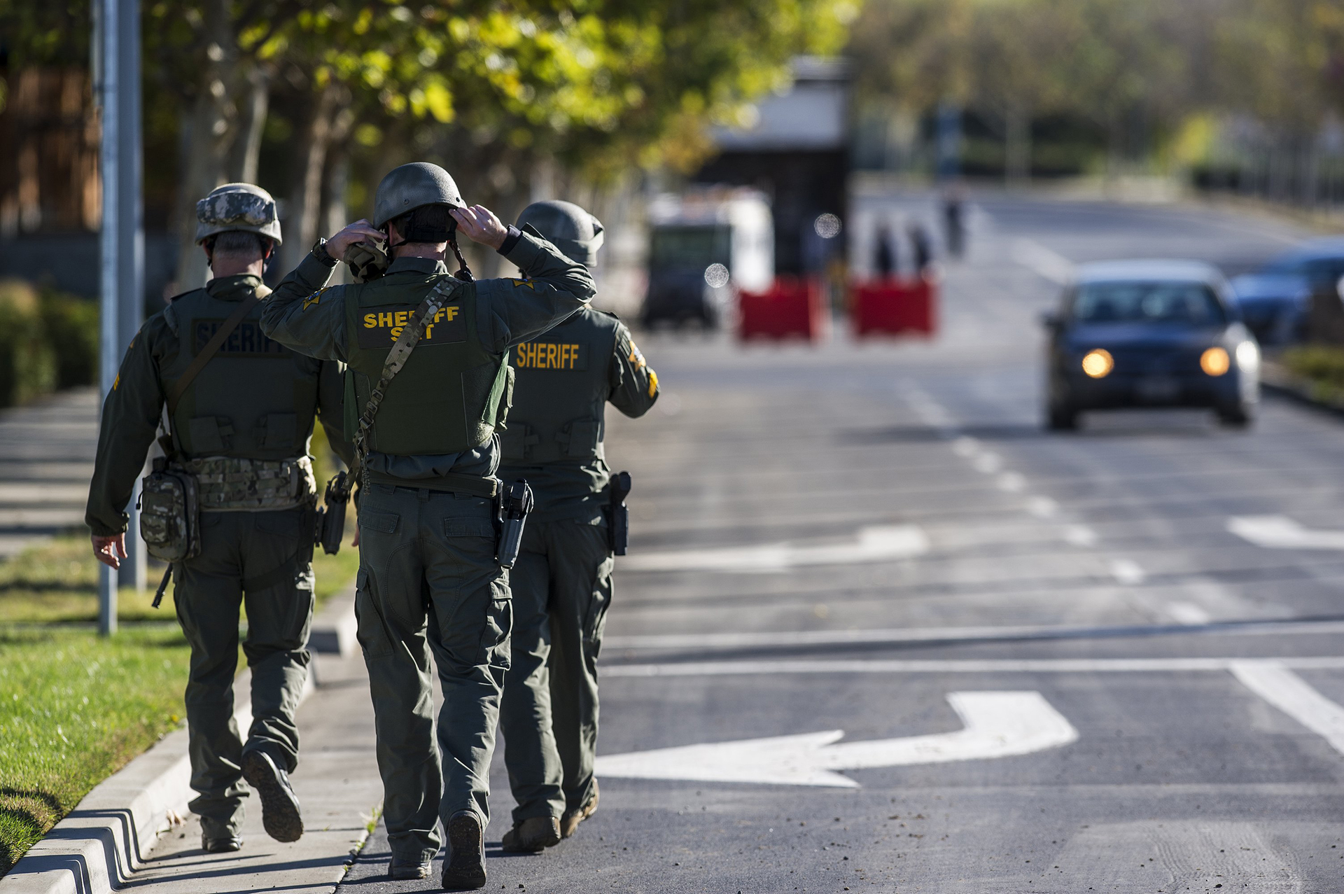 Merced County Sheriff SWAT members enter the University of California, Merced campus after a reported stabbing on Nov. 4 in Merced, Calif.