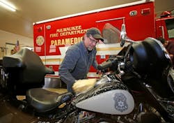 Bill Davidson, vice president of the Harley-Davidson Museum, washes a Milwaukee police motorcycle as other employees wash fire department vehicles in Milwaukee, Wisc. Harley-Davidson announced free Riding Academy motorcycle training to all U.S. first responders from January 1 to December 31, 2016. Bill Davidson, vice president of the Harley-Davidson Museum, washes a Milwaukee police motorcycle as other employees wash fire department vehicles in Milwaukee, Wisc. Harley-Davidson announced free Riding Academy motorcycle training to all U.S. first responders from January 1 to December 31, 2016.